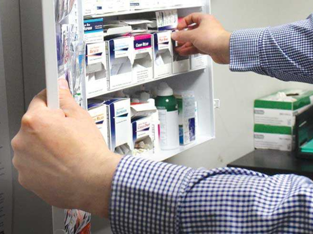 Inspecting first aid kits