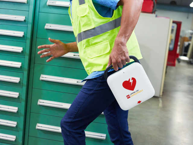 LIFEPAK CR2 In Use Man Runs w AED at Manufacturing Site