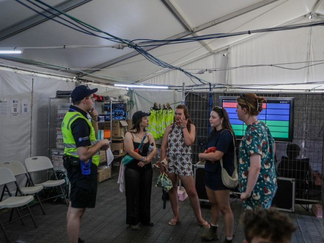 ProMED staff briefing inside a festival medical centre